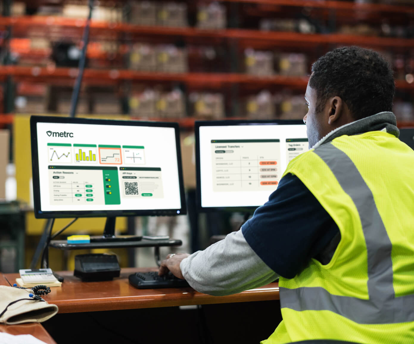 A warehouse worker using Metrc software