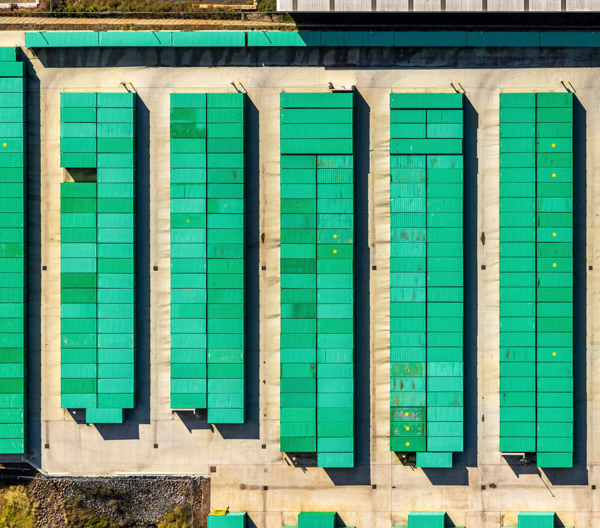 Shipping containers in a row, seen from above